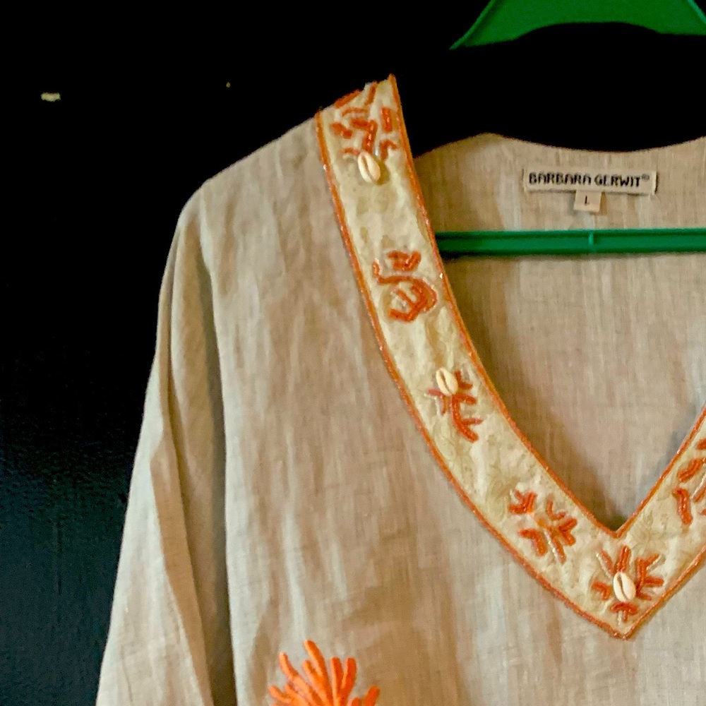 Light beige/coral tunic with embellishments.  Size L. Well cared for.